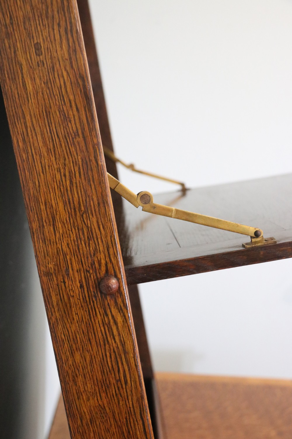 This early 20th century wall mounted oak combination desk and letter rack View VII
