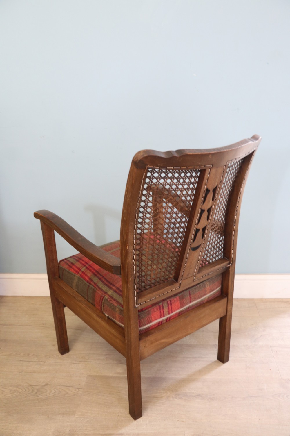 A lovely early 20th century beech framed armchair. View VIII