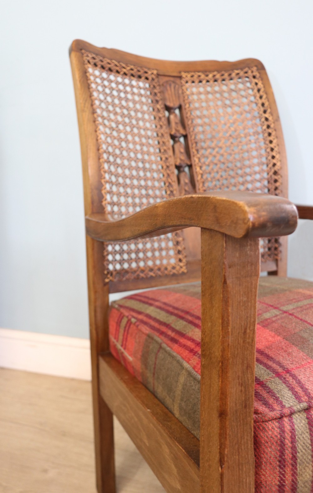 A lovely early 20th century beech framed armchair. View X