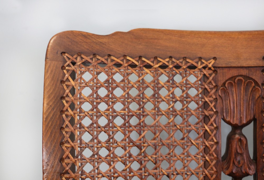 A lovely early 20th century beech framed armchair. View XIII