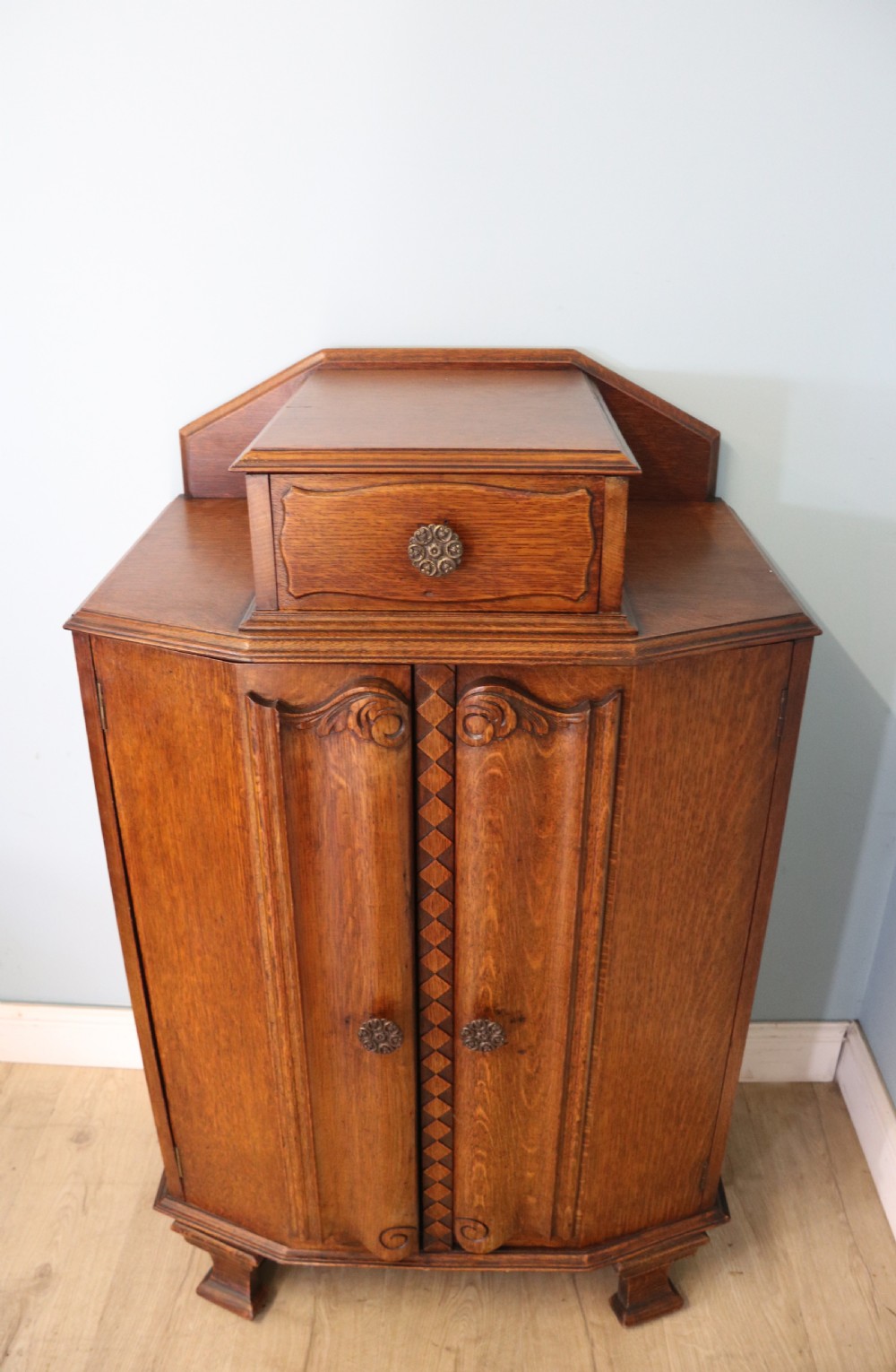 Oak side cabinet dates from the 1930s