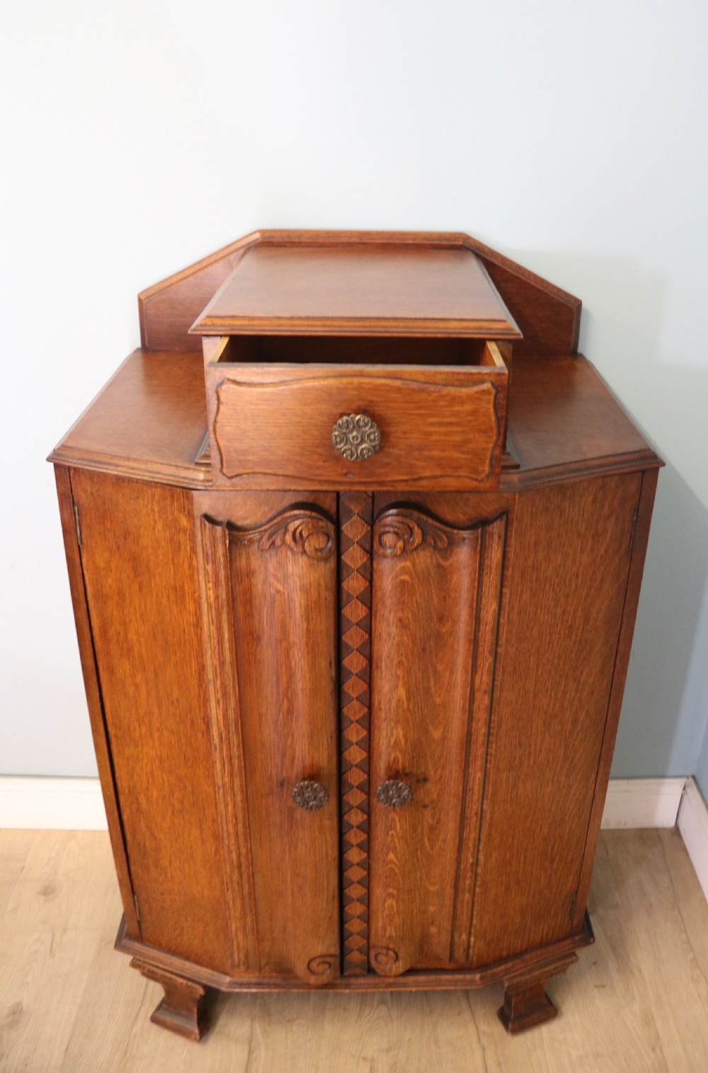 Oak side cabinet dates from the 1930s View II