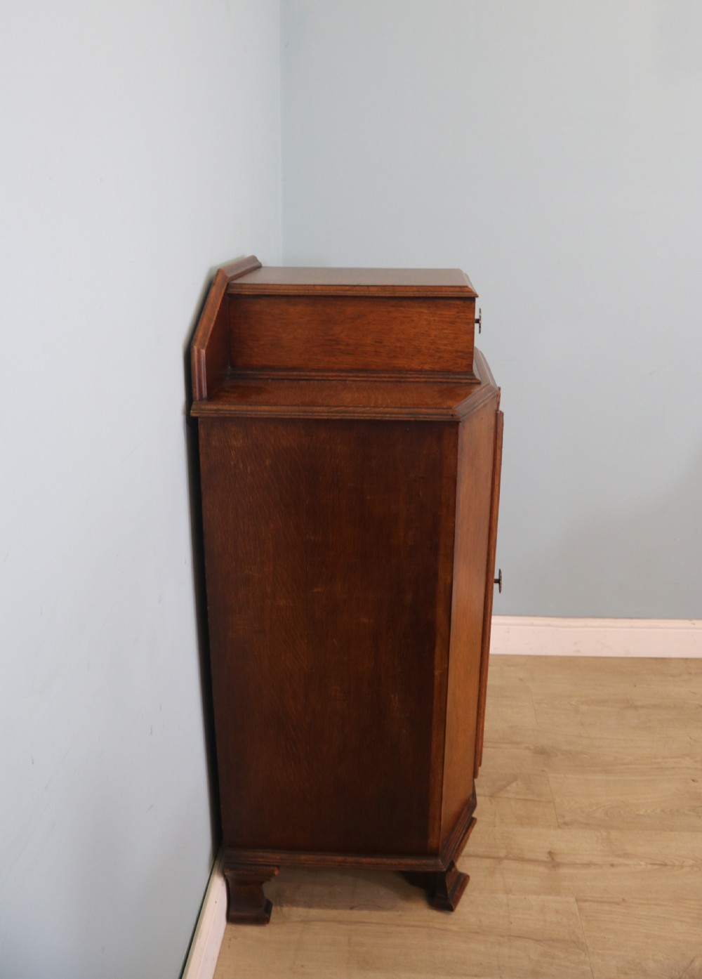 Oak side cabinet dates from the 1930s View V