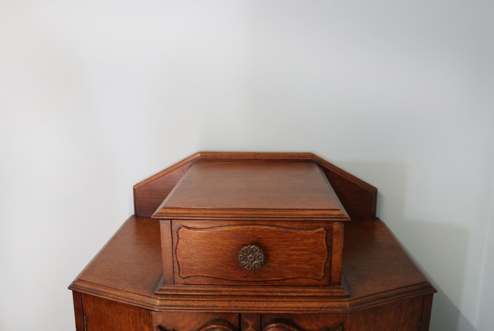 Oak side cabinet dates from the 1930s View VI