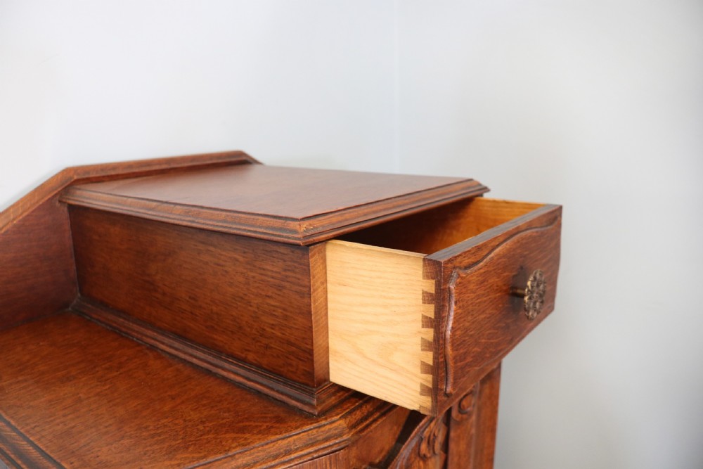 Oak side cabinet dates from the 1930s View VIII