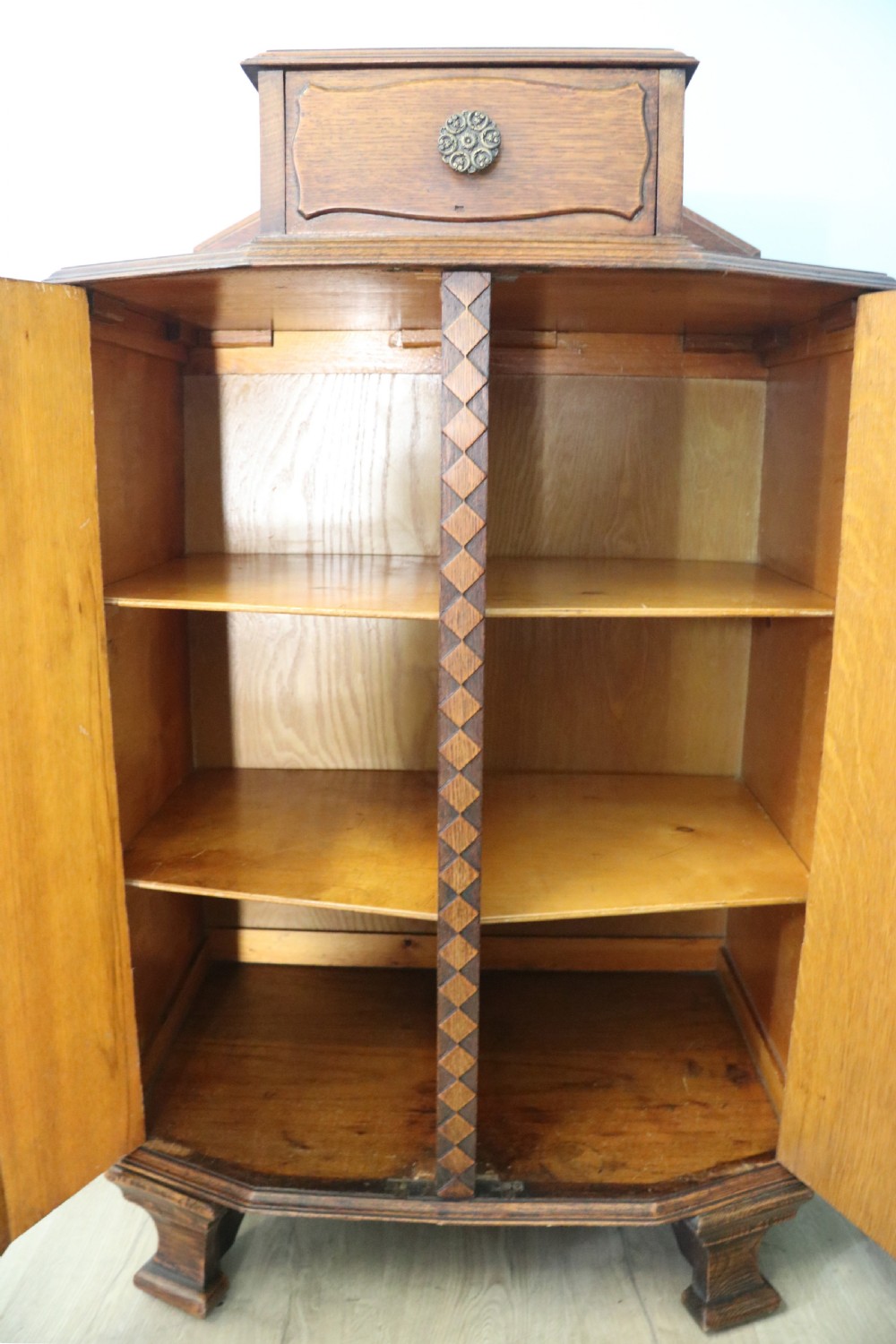 Oak side cabinet dates from the 1930s View XII