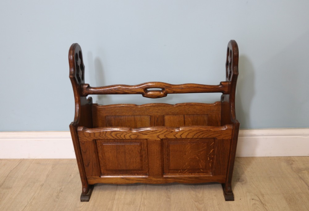 A lovely early 20th century oak magazine rack 