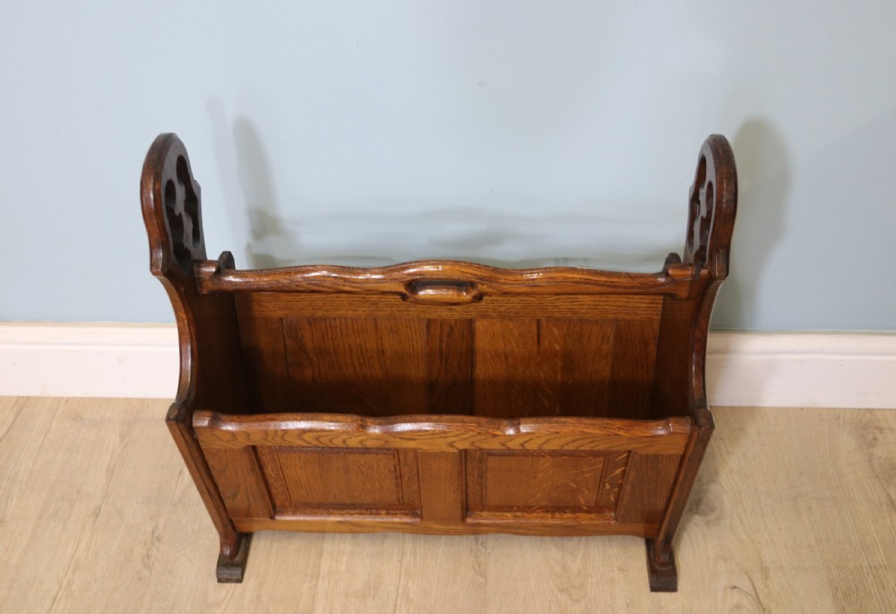 A lovely early 20th century oak magazine rack  View II