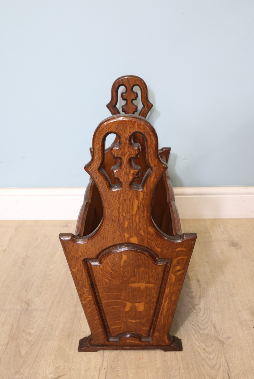 A lovely early 20th century oak magazine rack  View III