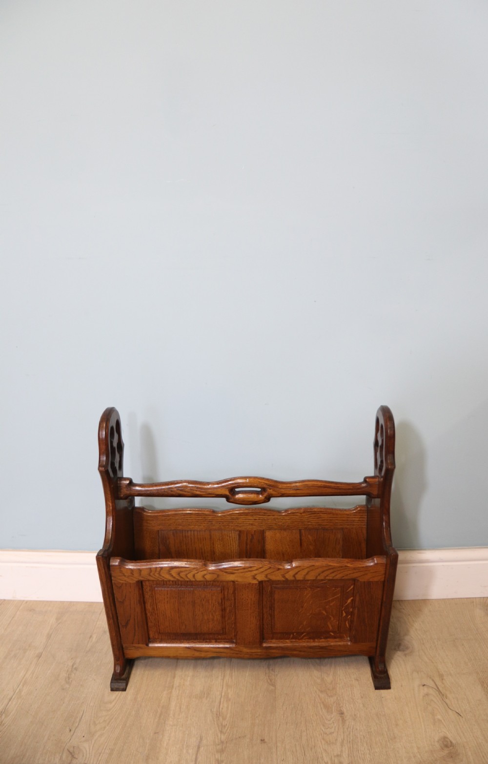A lovely early 20th century oak magazine rack  View IV
