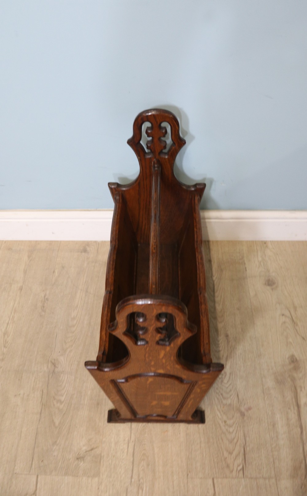 A lovely early 20th century oak magazine rack  View VI