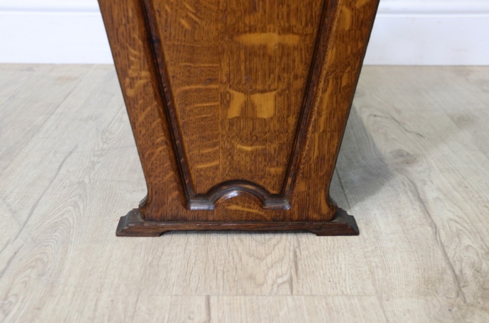 A lovely early 20th century oak magazine rack  View IX