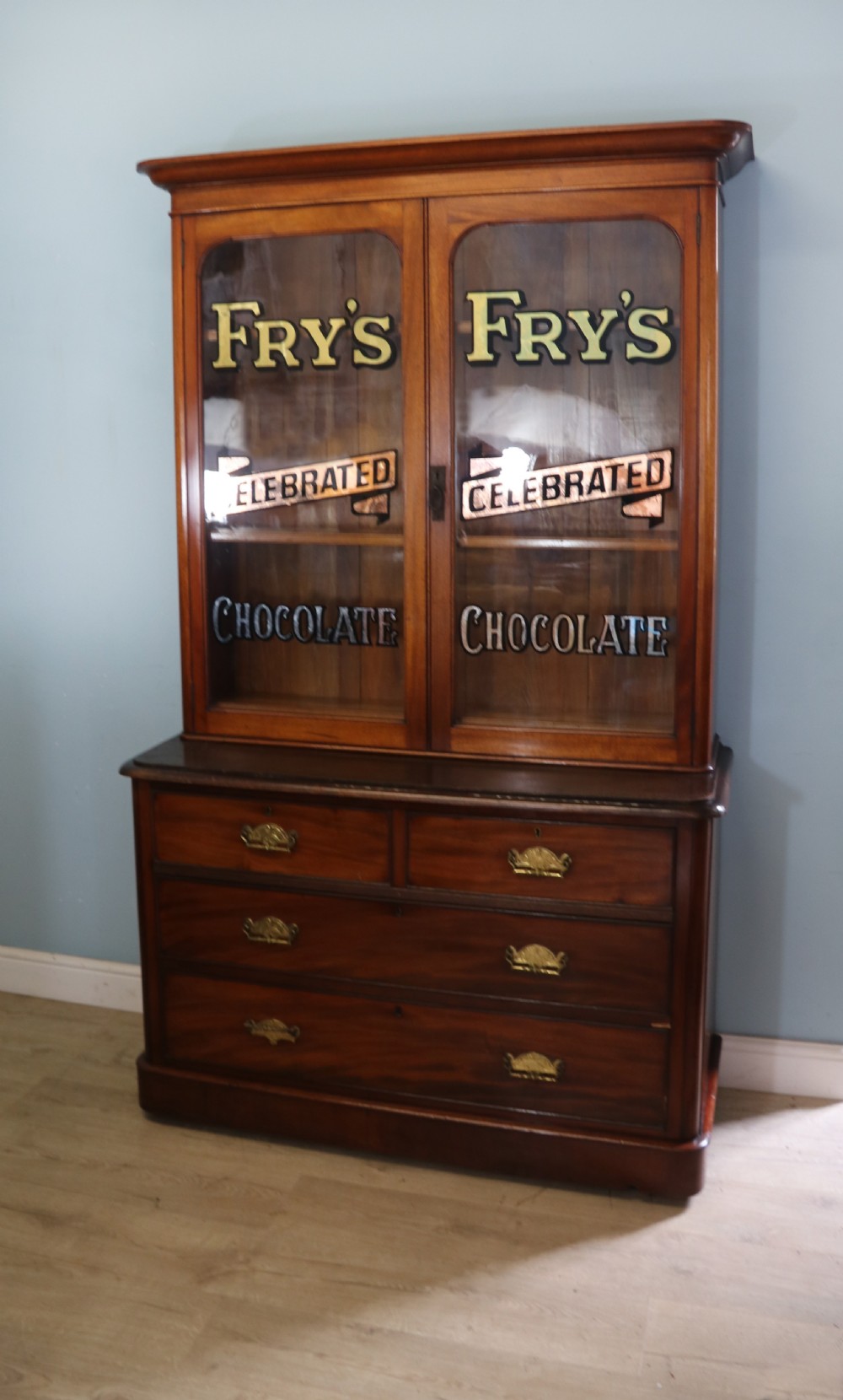 A lovely antique mahogany advertising cabinet.  View III