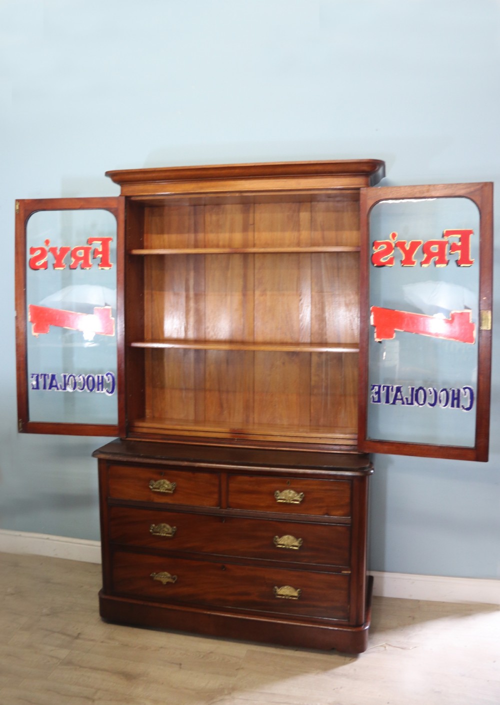 A lovely antique mahogany advertising cabinet.  View IV