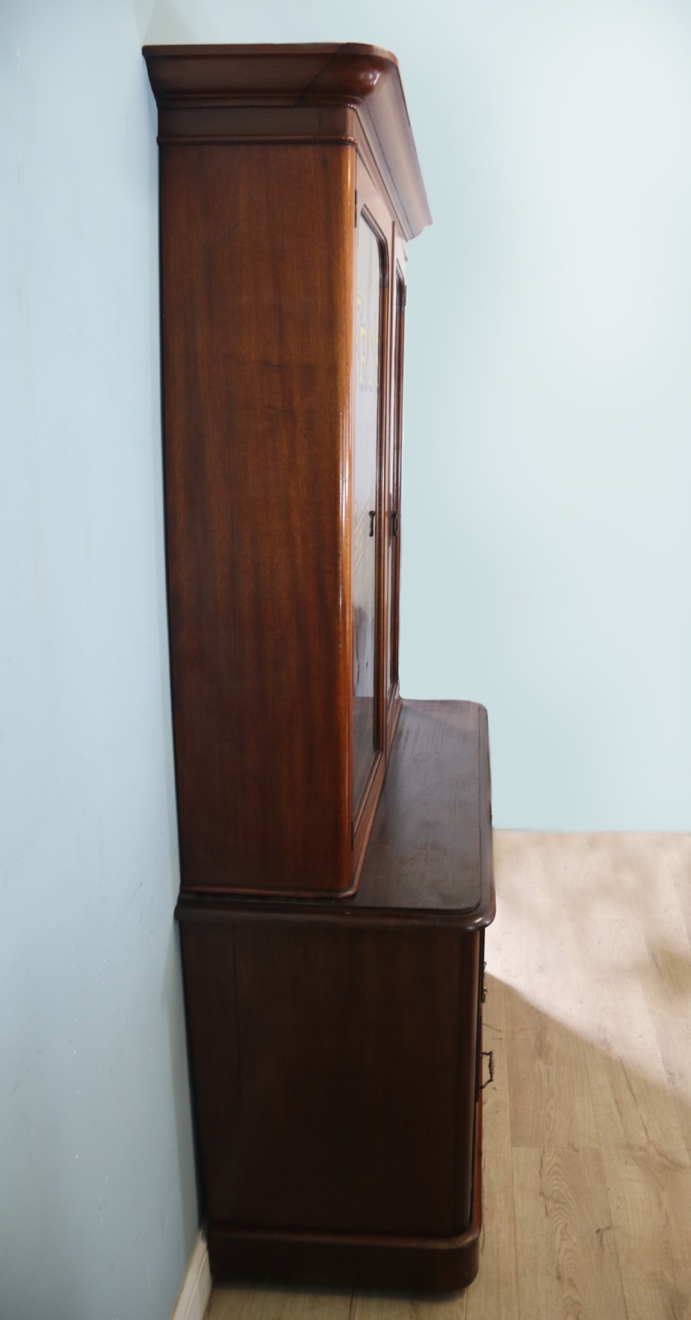 A lovely antique mahogany advertising cabinet.  View V