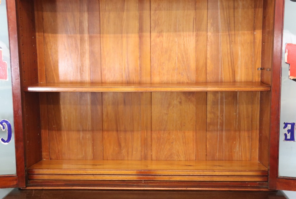 A lovely antique mahogany advertising cabinet.  View IX