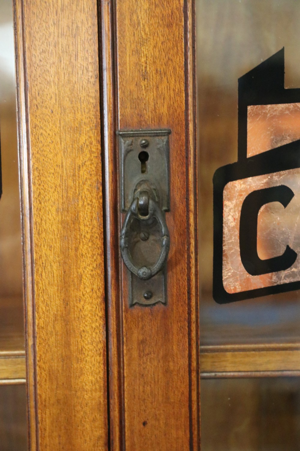 A lovely antique mahogany advertising cabinet.  View X