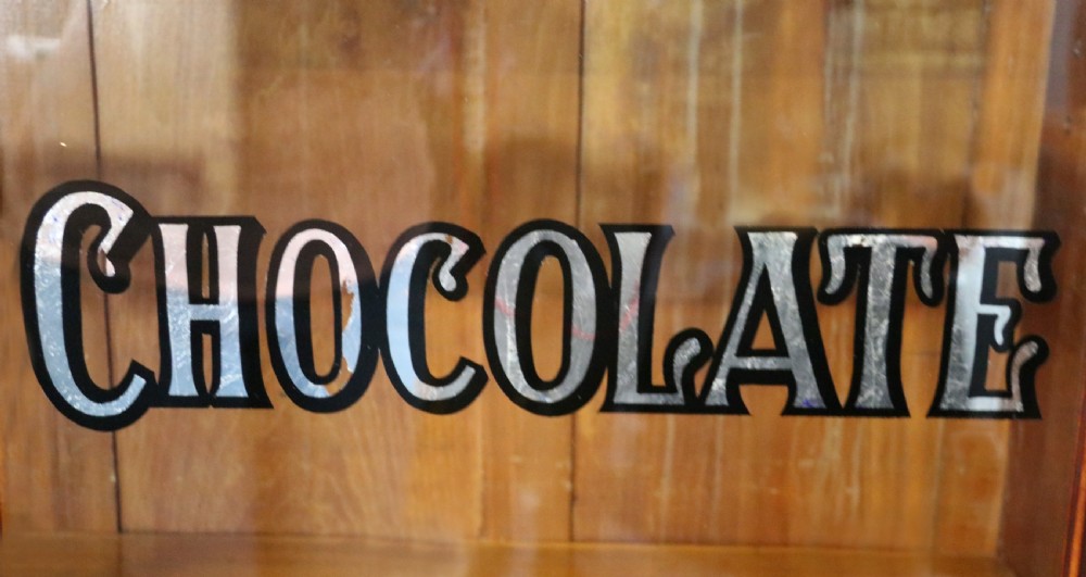 A lovely antique mahogany advertising cabinet.  View XIII