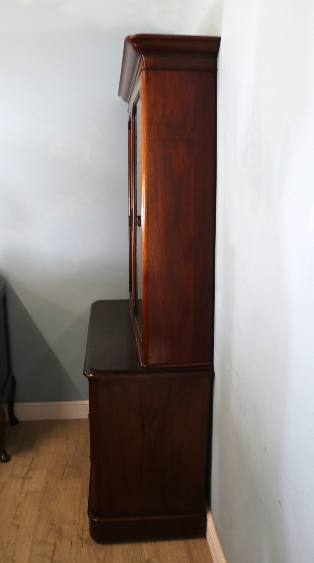 A lovely antique mahogany advertising cabinet.  View XVIII