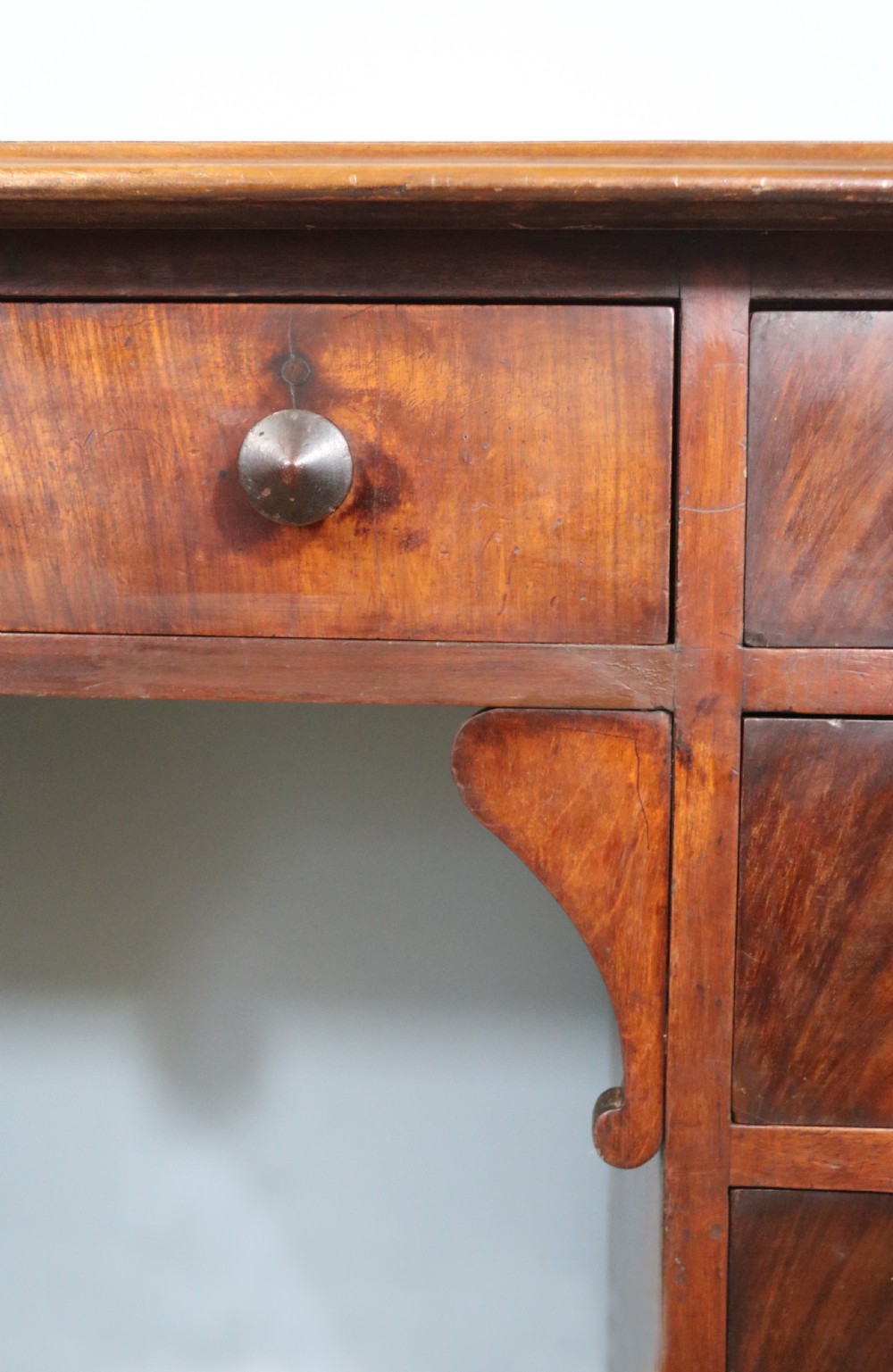 Lovely flame mahogany veneered twin pedestal desk has a tooled leather writing surface  View VIII