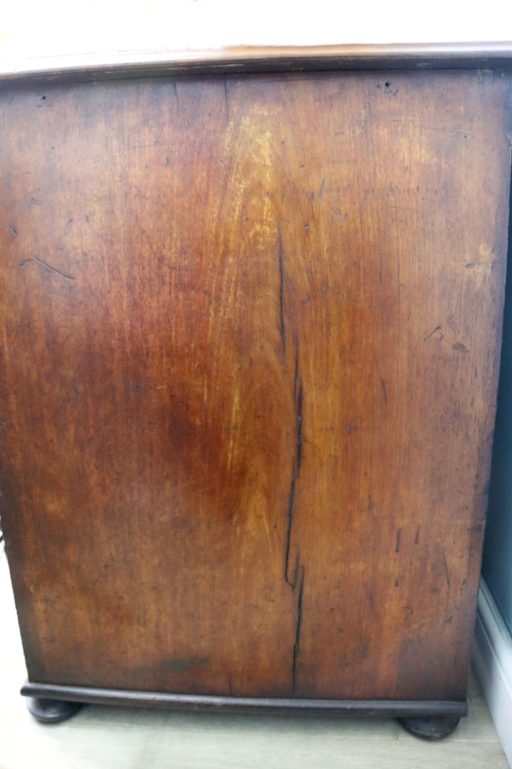 Lovely flame mahogany veneered twin pedestal desk has a tooled leather writing surface  View XIV