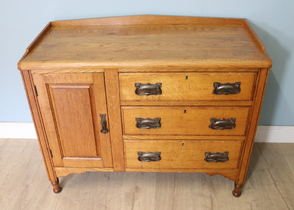 This lovely Arts and Crafts influenced side cabinet View II