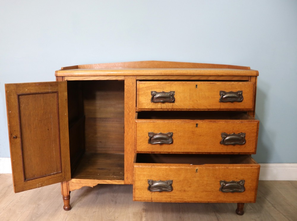 This lovely Arts and Crafts influenced side cabinet View IV