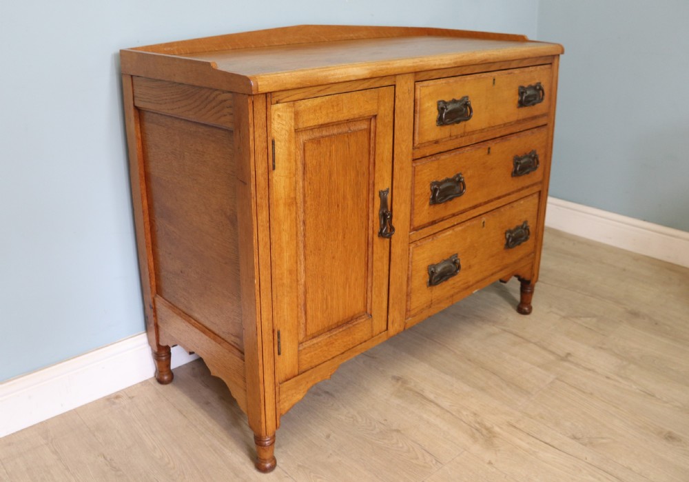 This lovely Arts and Crafts influenced side cabinet View VI