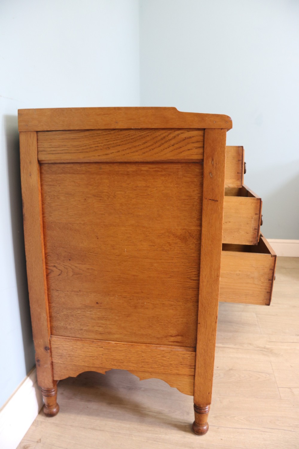 This lovely Arts and Crafts influenced side cabinet View VIII