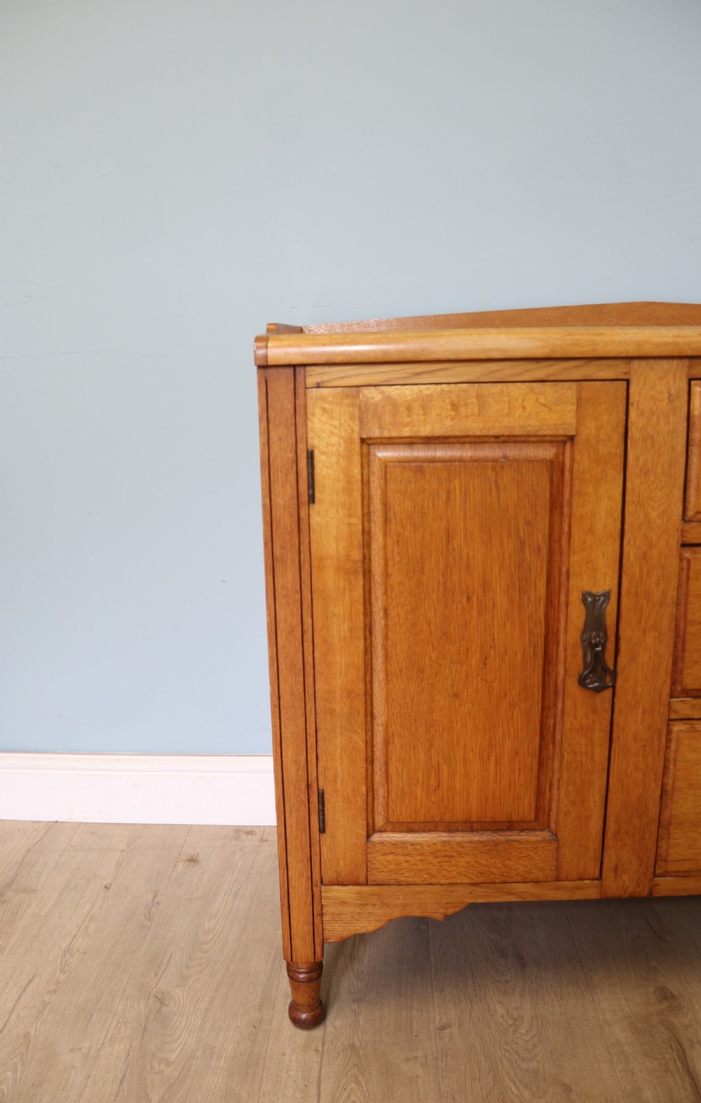 This lovely Arts and Crafts influenced side cabinet View X