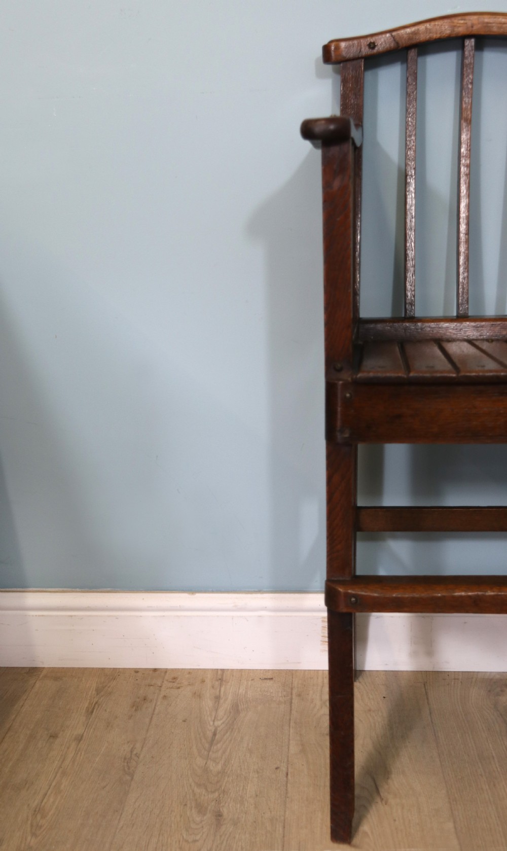 A lovely early 20th century oak highchair.  View X