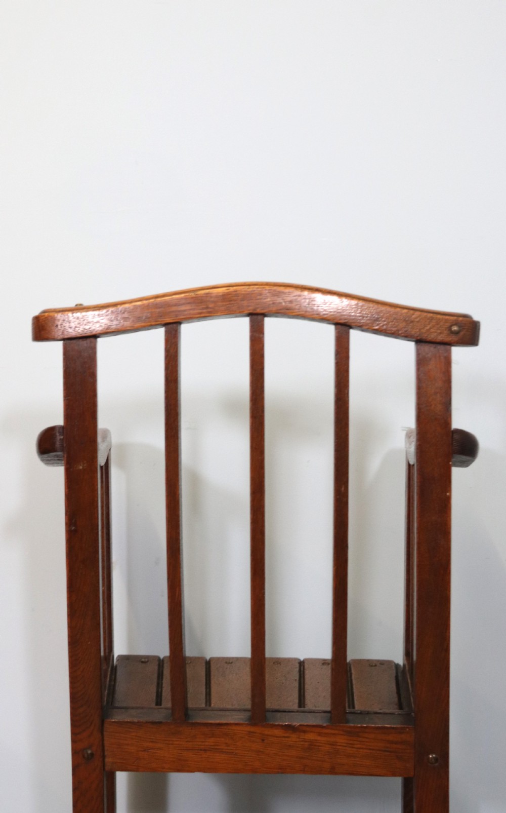 A lovely early 20th century oak highchair.  View XI