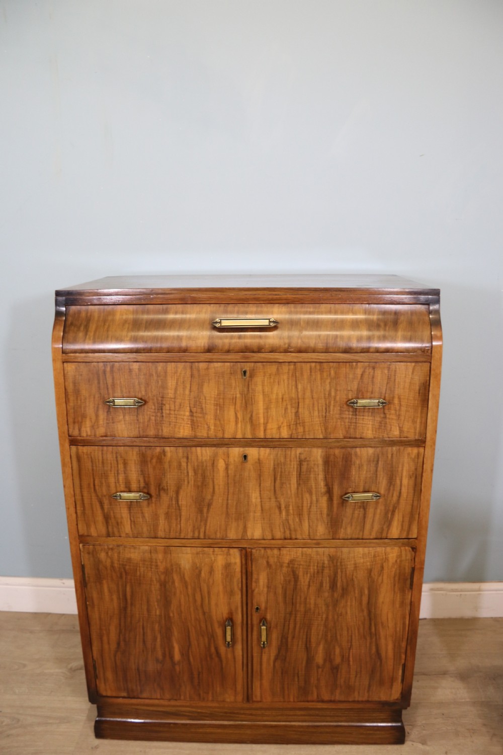 A lovely tall boy cabinet 