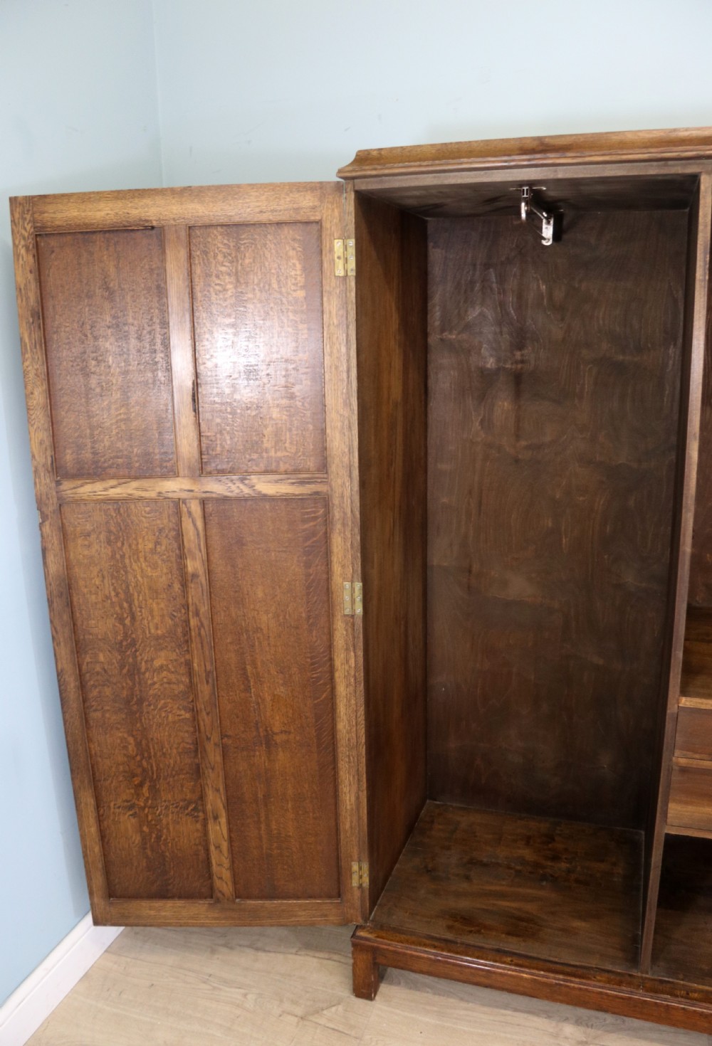 A lovely late 19th or early 20th century oak wardrobe in the ‘campaign’ style. View XV