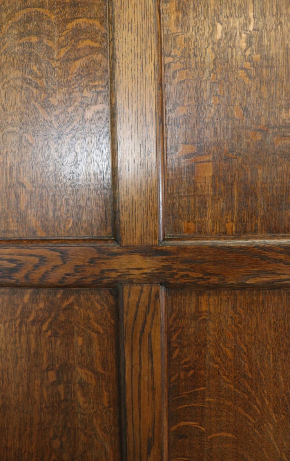 A lovely late 19th or early 20th century oak wardrobe in the ‘campaign’ style. View XVIII