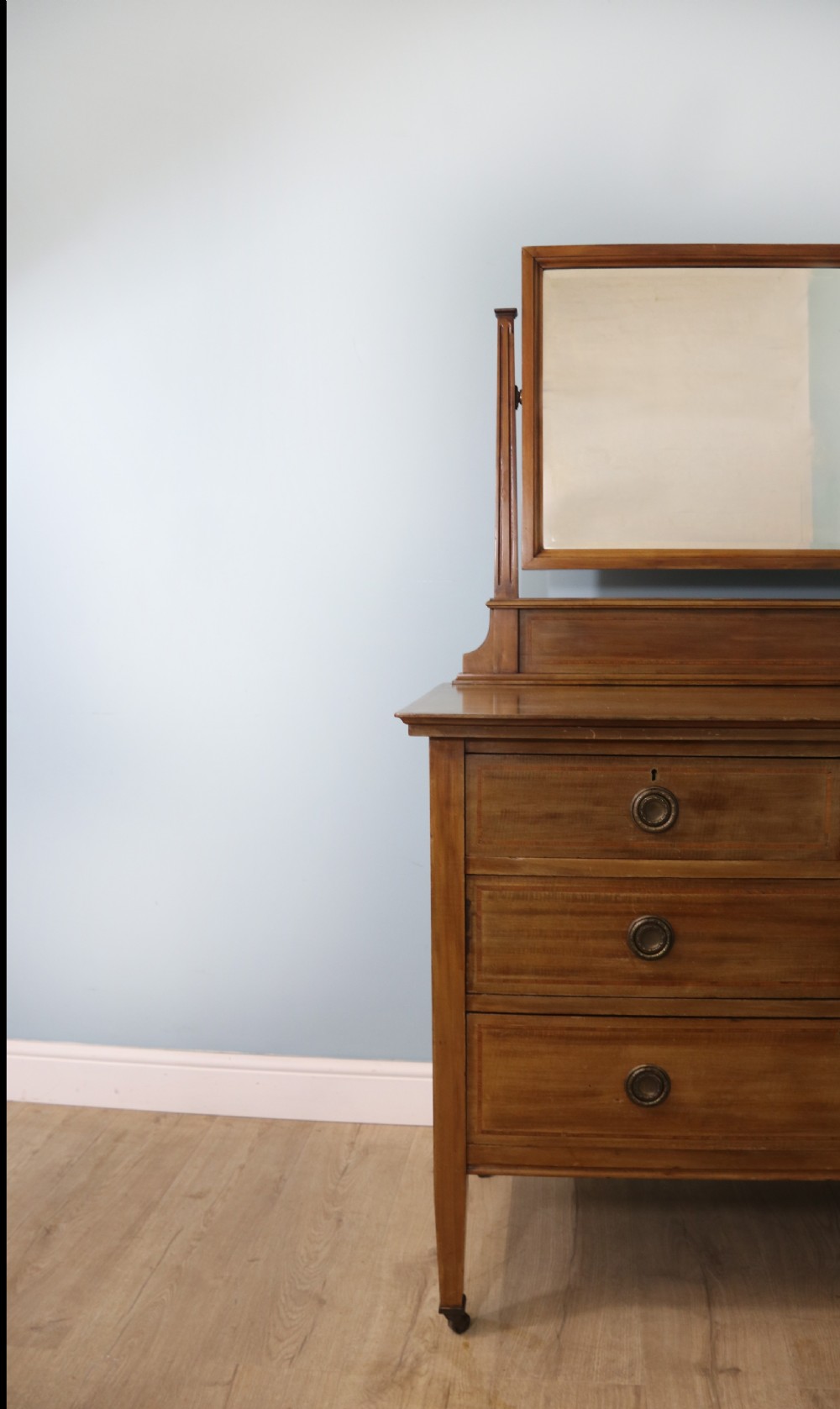 A lovely late 19th century American Walnut dressing chest.  View VII