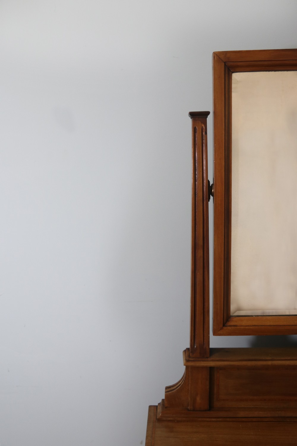 A lovely late 19th century American Walnut dressing chest.  View VIII