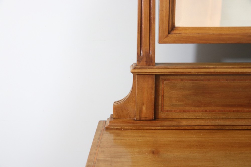 A lovely late 19th century American Walnut dressing chest.  View IX