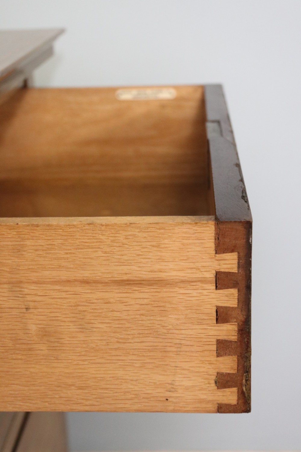 A lovely late 19th century American Walnut dressing chest.  View XIV