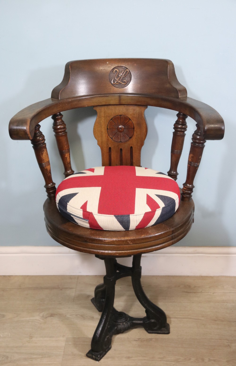 A wonderful late Victorian walnut framed and cast iron based revolving office chair