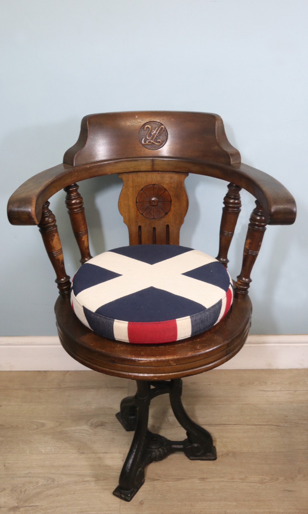 A wonderful late Victorian walnut framed and cast iron based revolving office chair View II