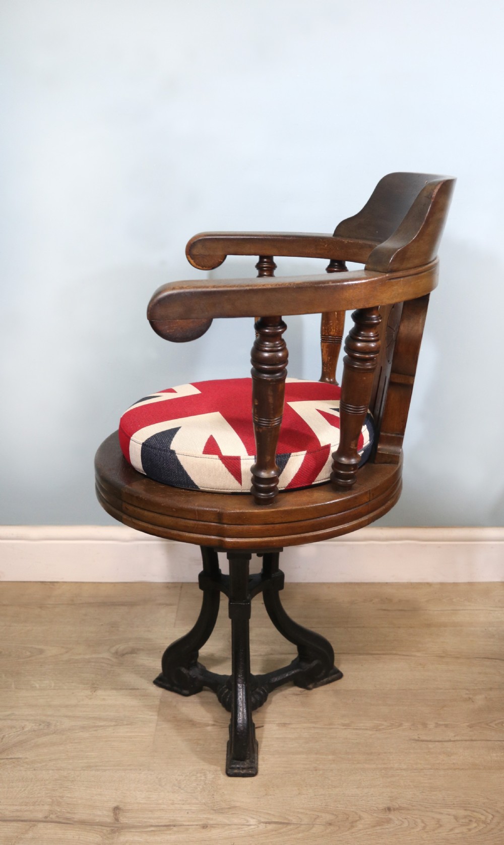 A wonderful late Victorian walnut framed and cast iron based revolving office chair View V