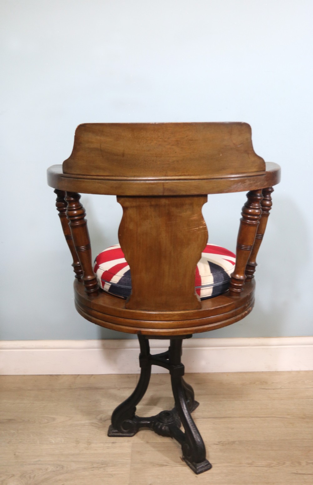 A wonderful late Victorian walnut framed and cast iron based revolving office chair View VII