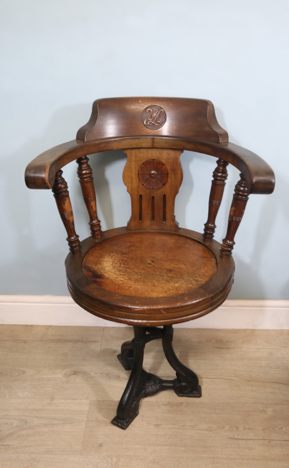 A wonderful late Victorian walnut framed and cast iron based revolving office chair View X