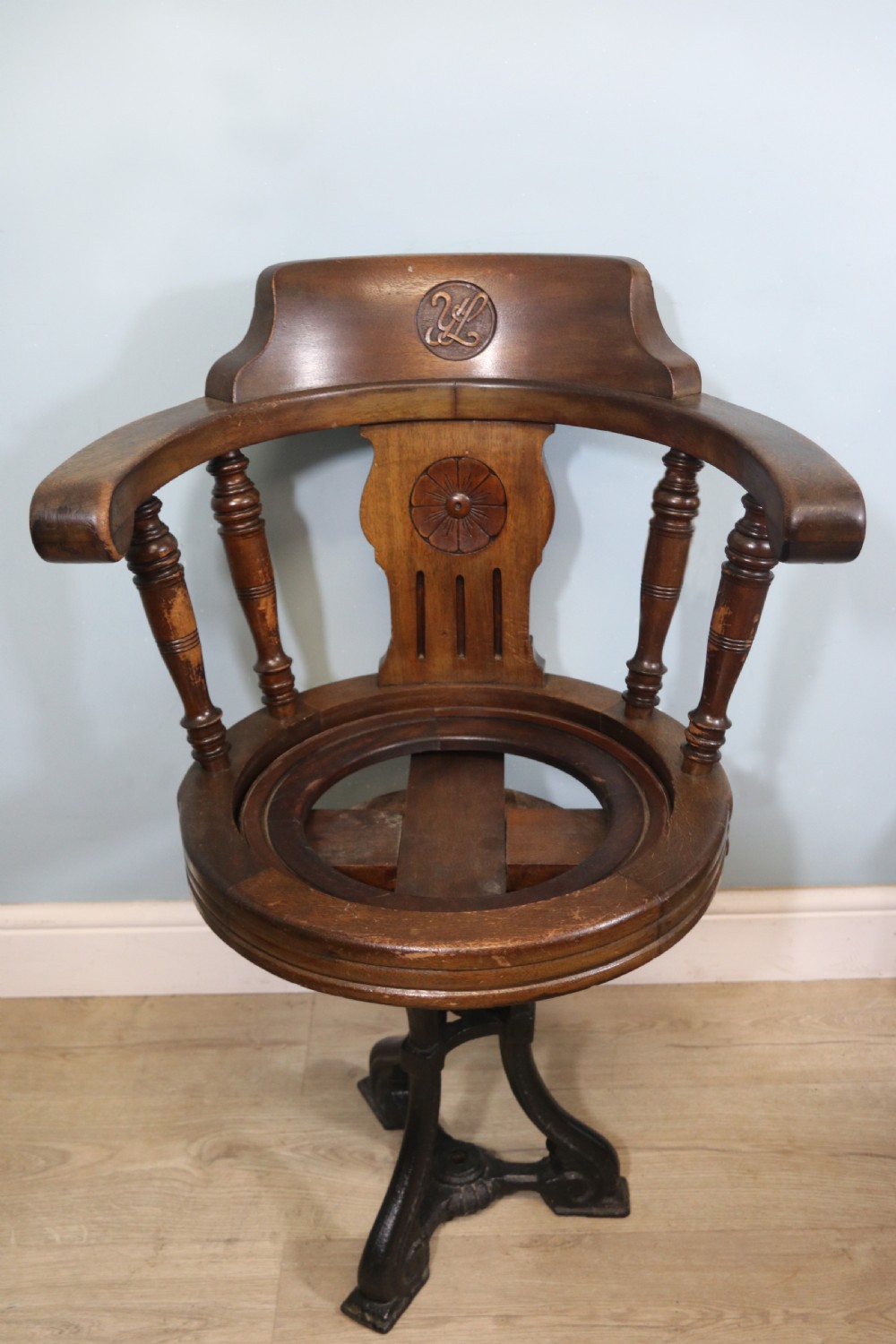 A wonderful late Victorian walnut framed and cast iron based revolving office chair View XI