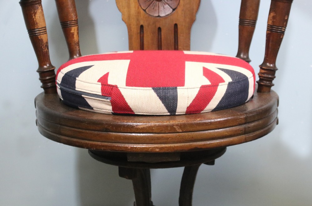 A wonderful late Victorian walnut framed and cast iron based revolving office chair View XVIII