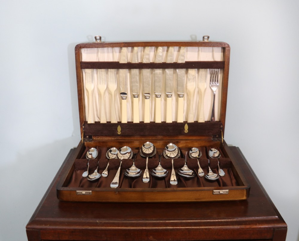  A lovely six-person canteen of silver plated and steel cutlery. 