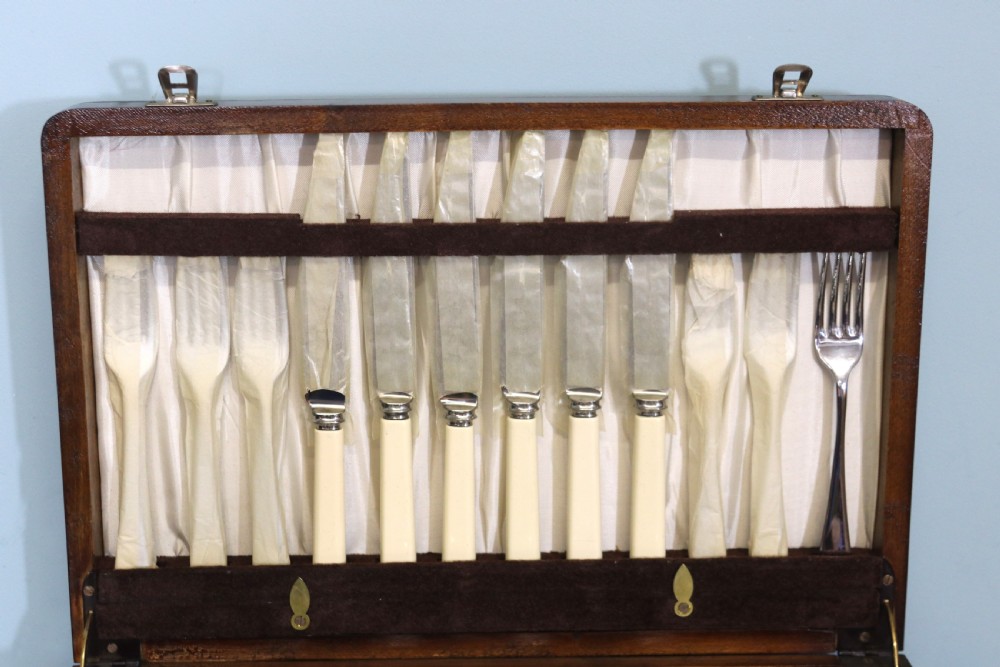  A lovely six-person canteen of silver plated and steel cutlery.  View III