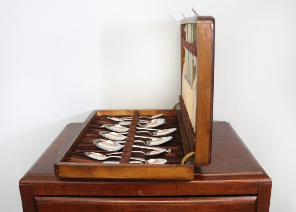  A lovely six-person canteen of silver plated and steel cutlery.  View IV