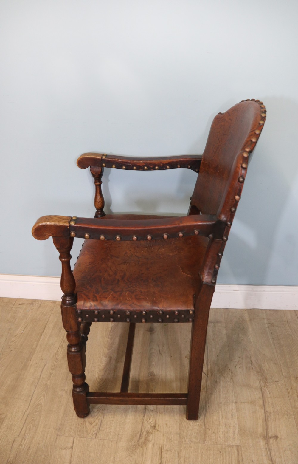A lovely set of six early 20th Cromwellian style industrial looking dining chairs. View VI